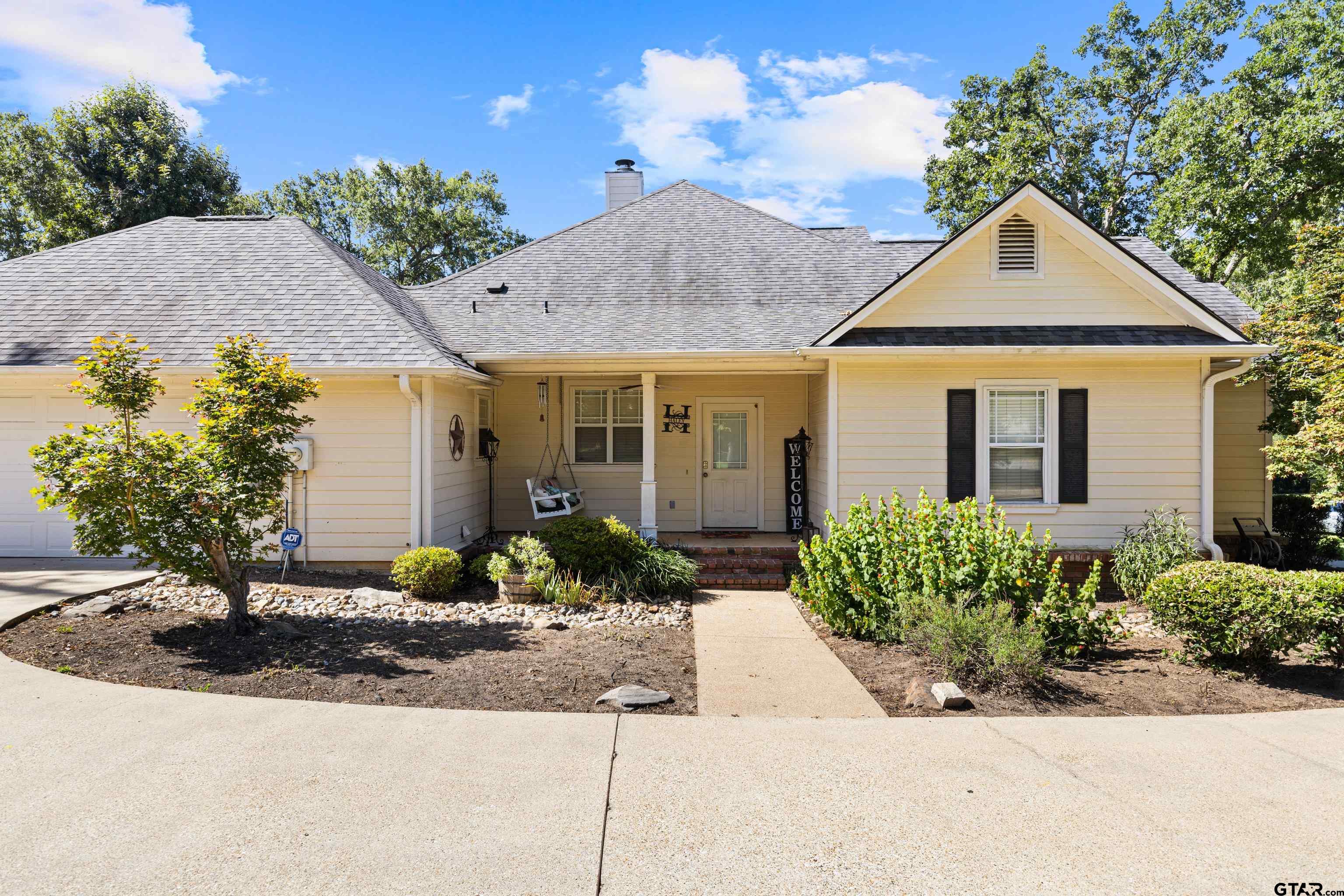 5201 Whitaker Circle Longview, TX 75605 - Photo 33 of 40 a front view of a house with garden