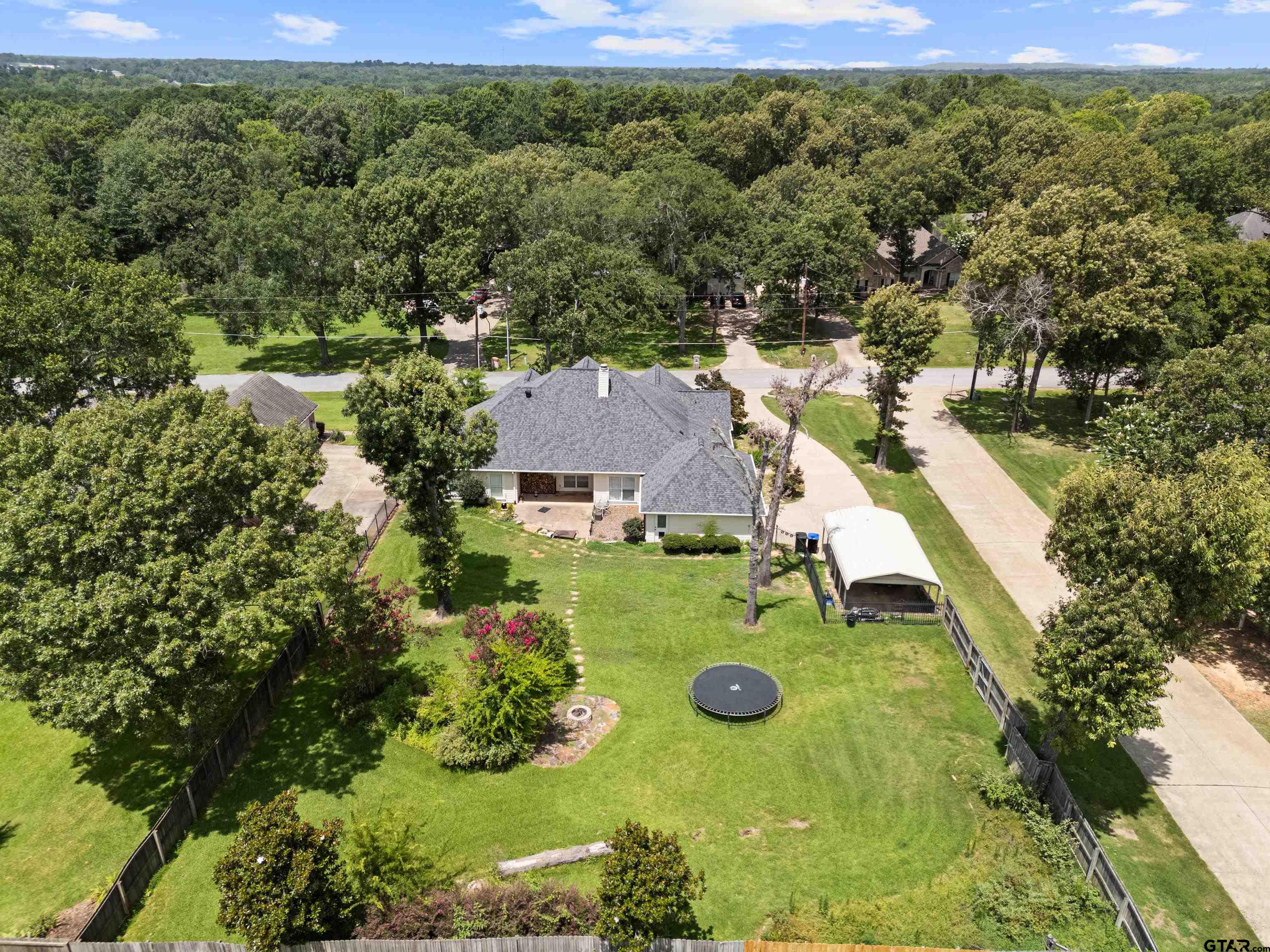 5201 Whitaker Circle Longview, TX 75605 - Photo 36 of 40 an aerial view of a house with yard