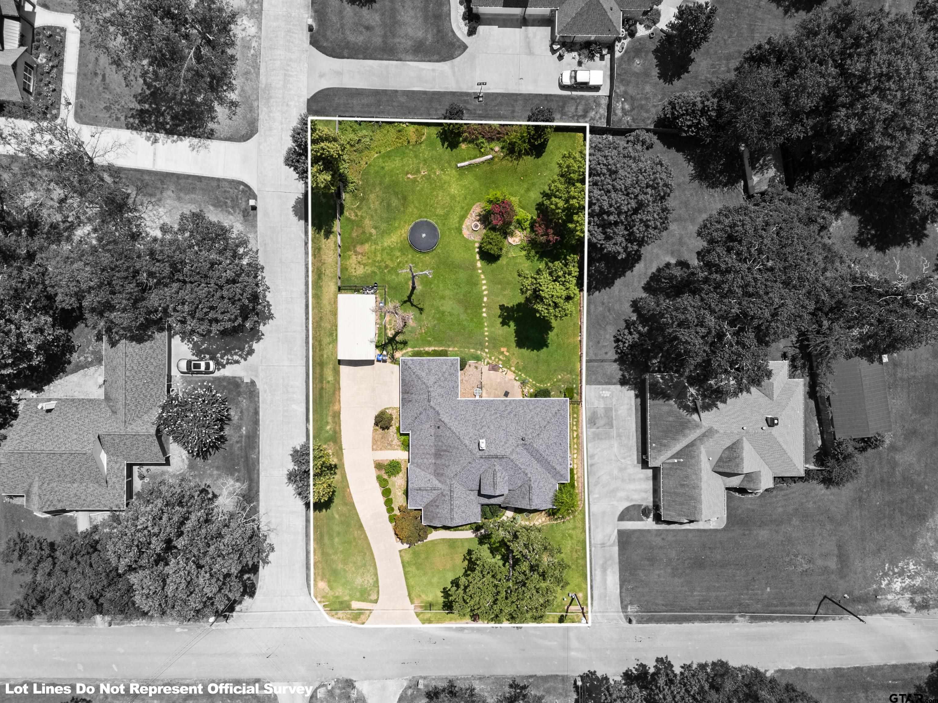 5201 Whitaker Circle Longview, TX 75605 - Photo 38 of 40 an aerial view of a house with a swimming pool