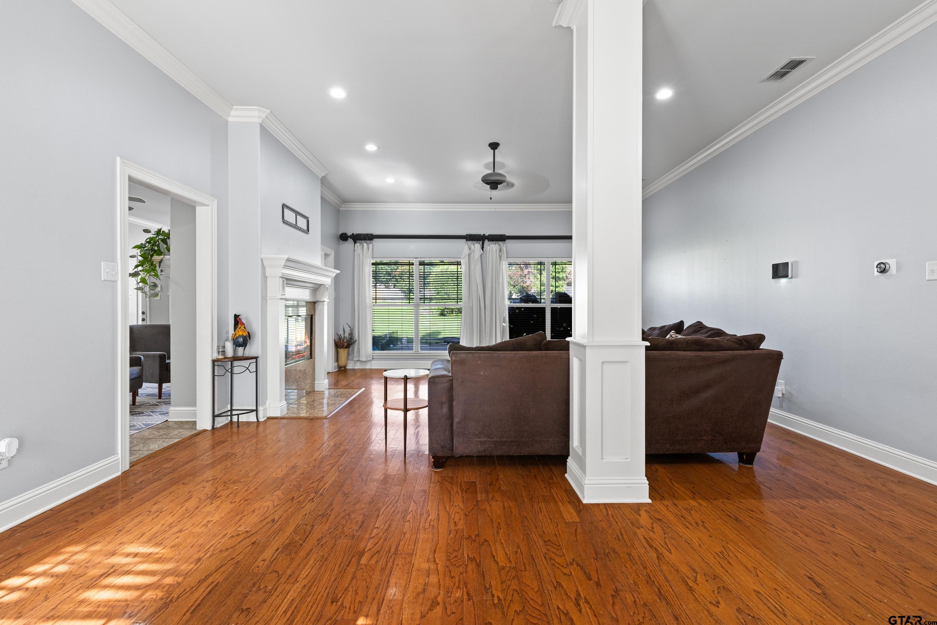 5201 Whitaker Circle Longview, TX 75605 - Photo 5 of 40 a living room with furniture and a wooden floor