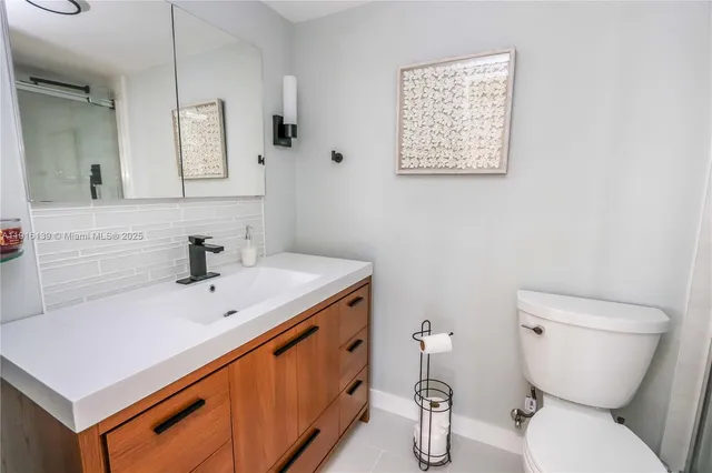 a view of a balcony with dining space