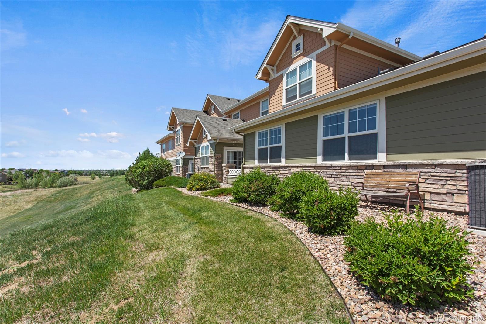 3703 South Perth Circle, Unit 101 Aurora, CO 80013 - Photo 29 of 30 a view of a house with a yard
