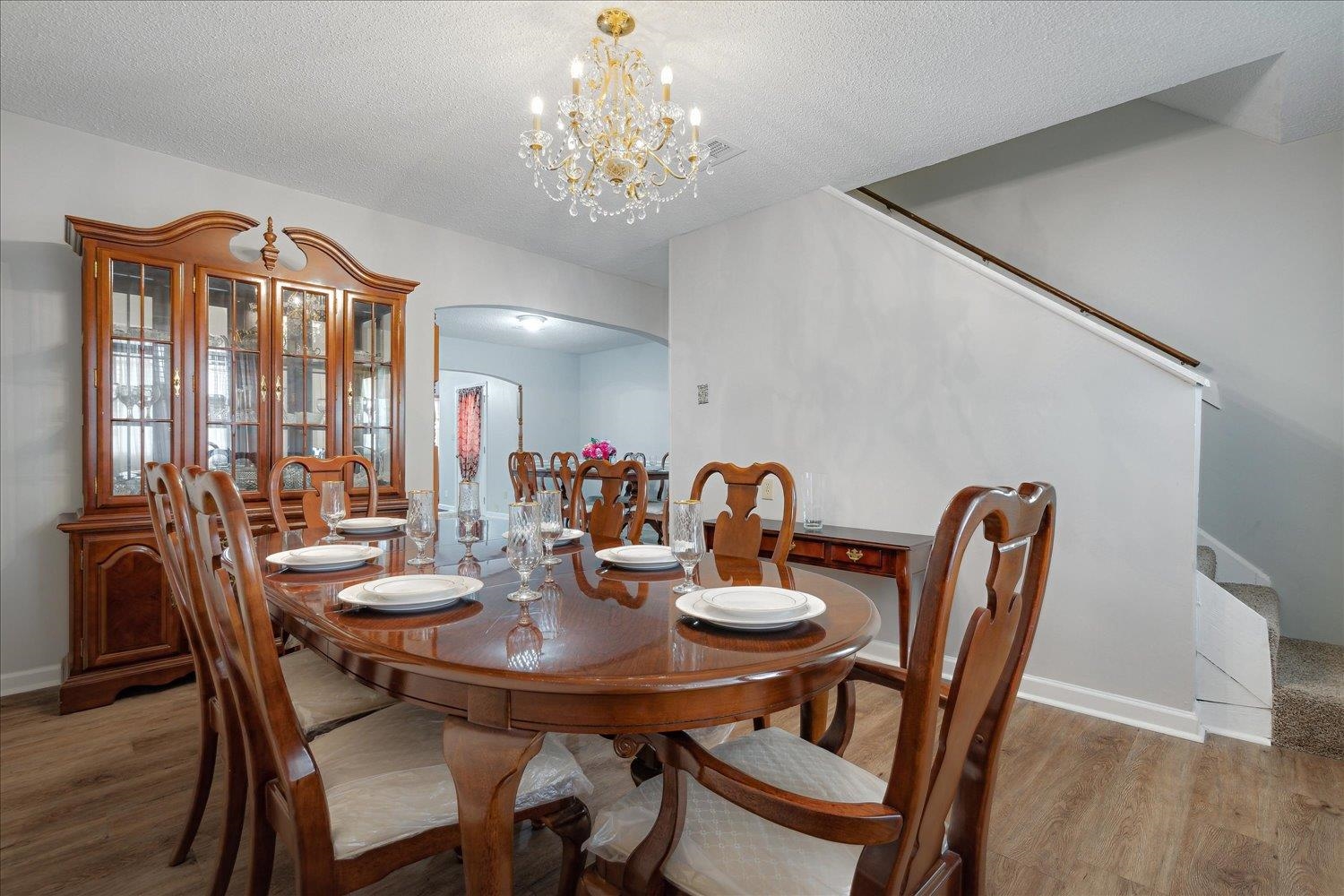 4141 Archer Drive Memphis, TN 38109 - Photo 4 of 26 a view of a dining room with furniture and chandelier