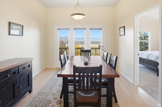 14820 175 East Draper, UT 84020 - Photo 8 of 39 Dining space featuring light wood finished floors and baseboards