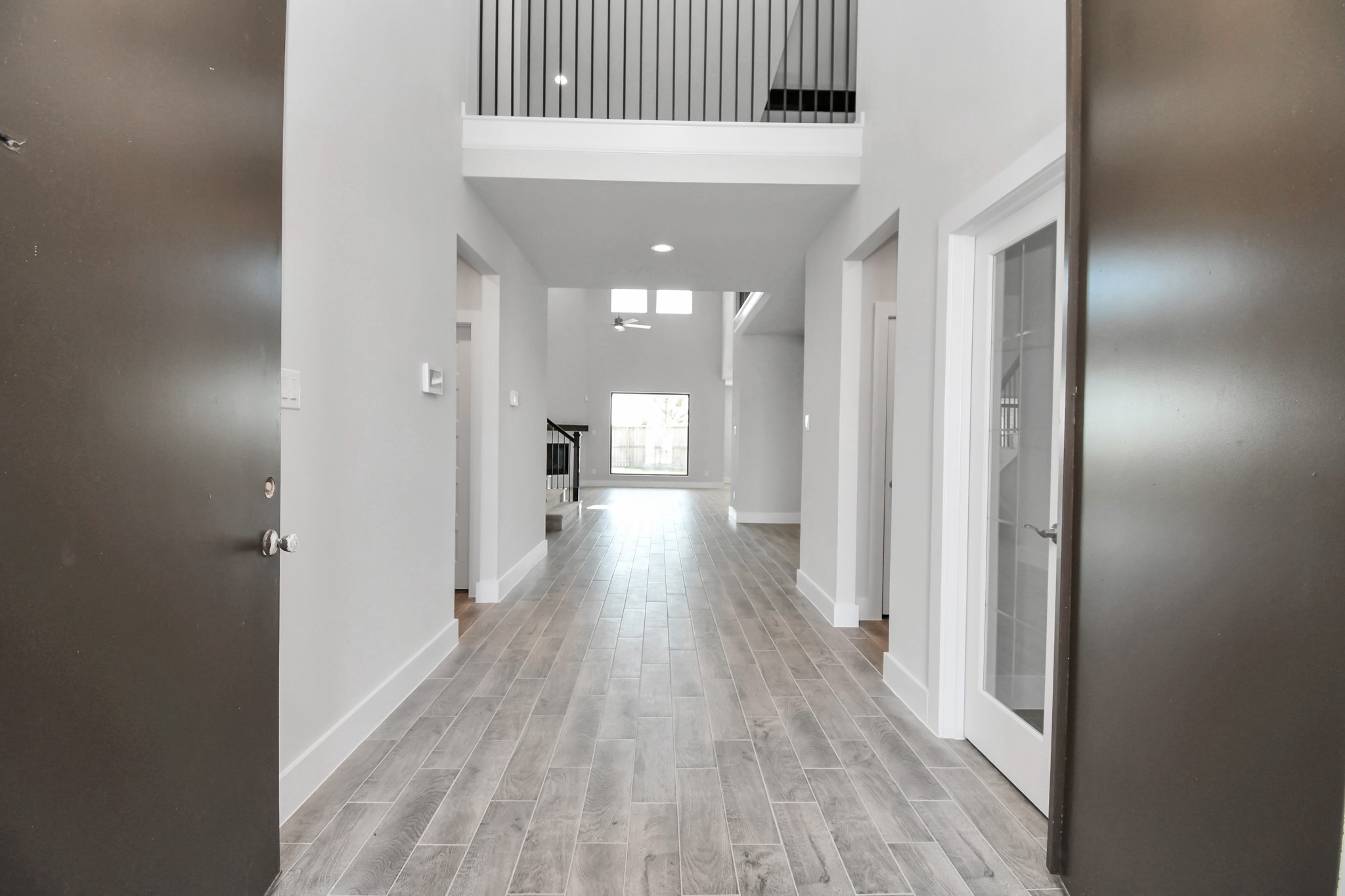 3103 Native Spg Drive Spring, TX 77373 - Photo 4 of 36 a view of a hallway with wooden floor
