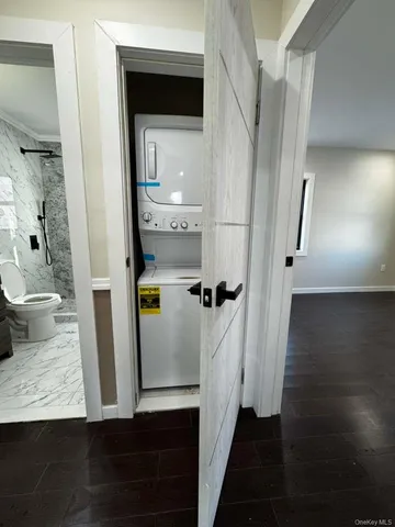 a view of bathroom with a sink and mirror