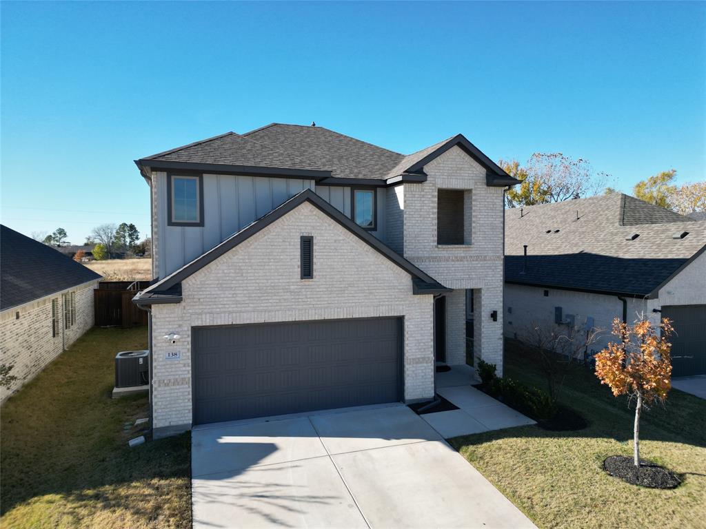 138 Mandarin Street Forney, TX 75126 - Photo 2 of 7 a front view of a house with a yard