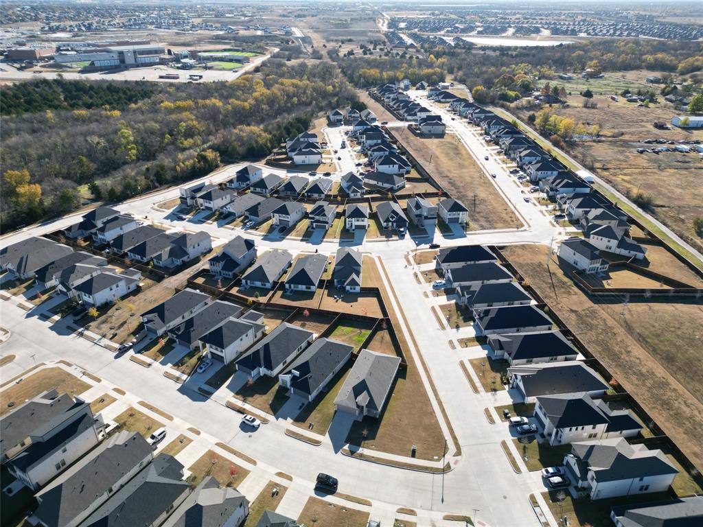 138 Mandarin Street Forney, TX 75126 - Photo 6 of 7 an aerial view of residential houses with outdoor space