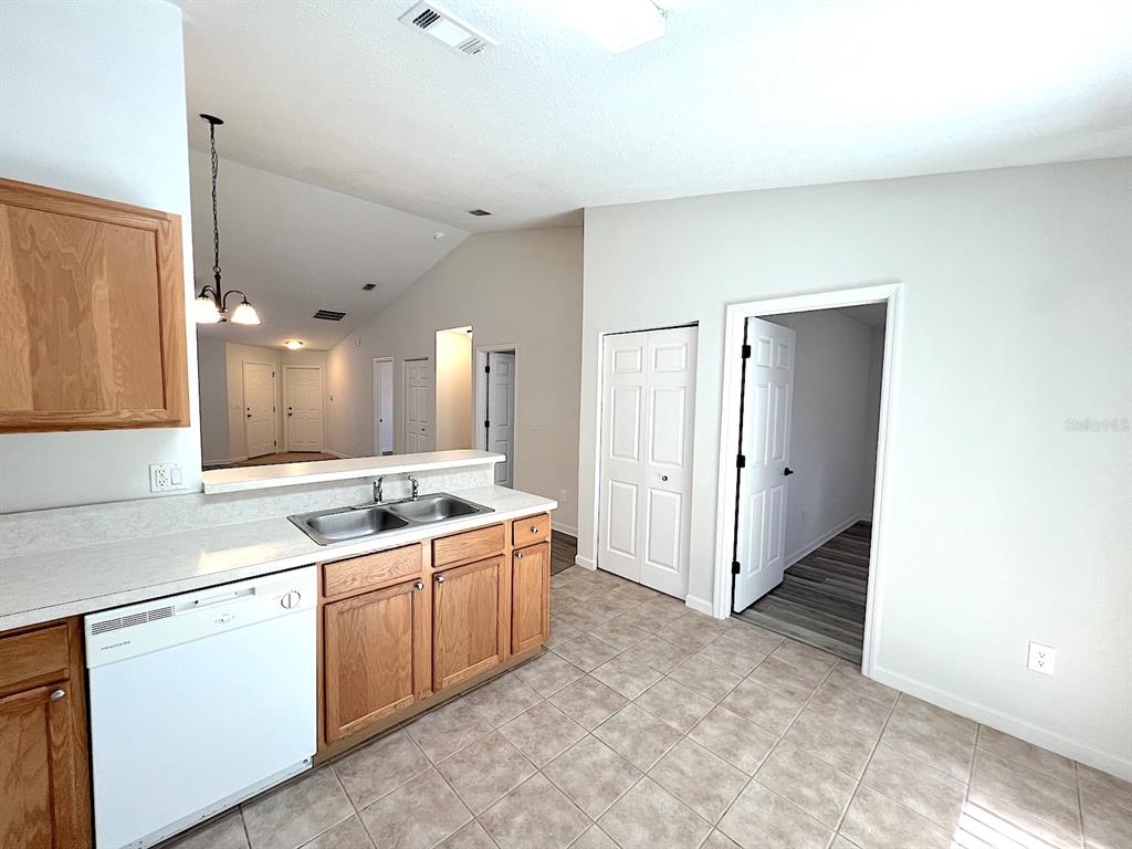 20 Plateau Lane, Unit A Palm Coast, FL 32164 - Photo 16 of 37 a view of a kitchen with a sink