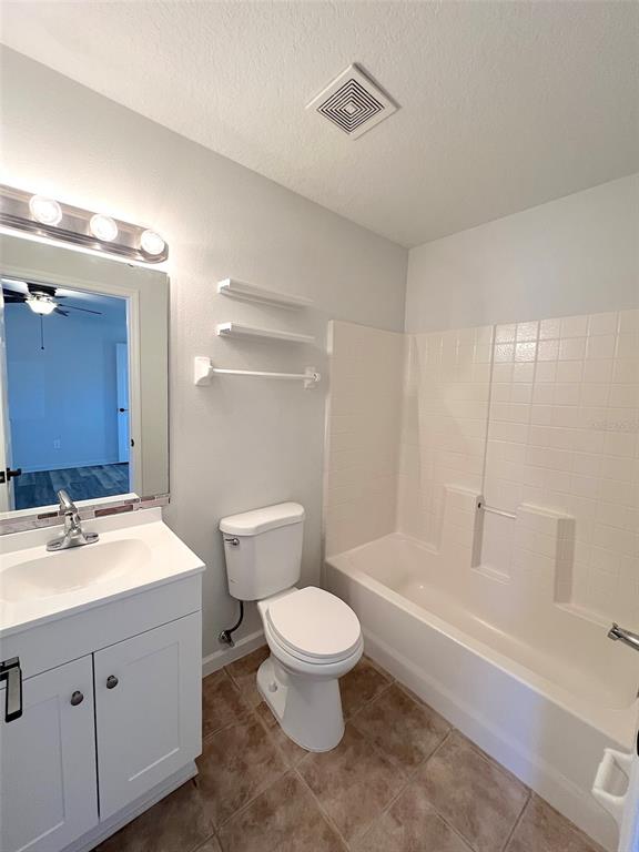 20 Plateau Lane, Unit A Palm Coast, FL 32164 - Photo 22 of 37 a bathroom with a sink a toilet and shower