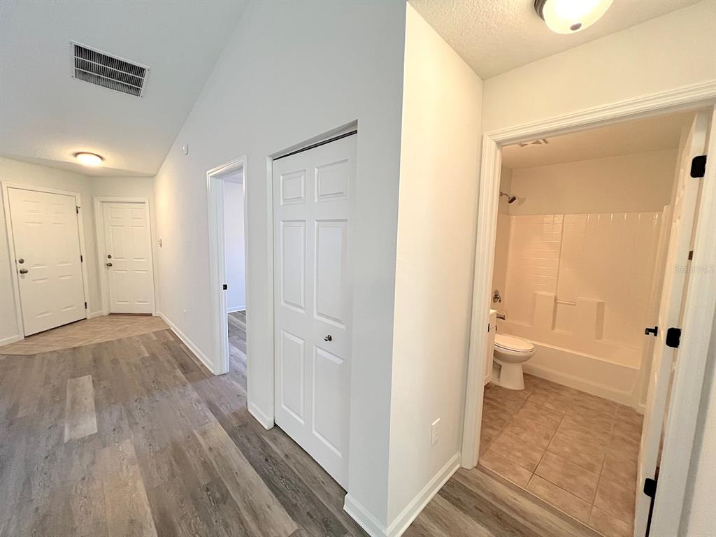 20 Plateau Lane, Unit A Palm Coast, FL 32164 - Photo 26 of 37 a bathroom with a sink and a toilet