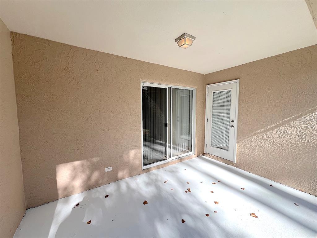 20 Plateau Lane, Unit A Palm Coast, FL 32164 - Photo 35 of 37 a view of wooden floor and windows in a room