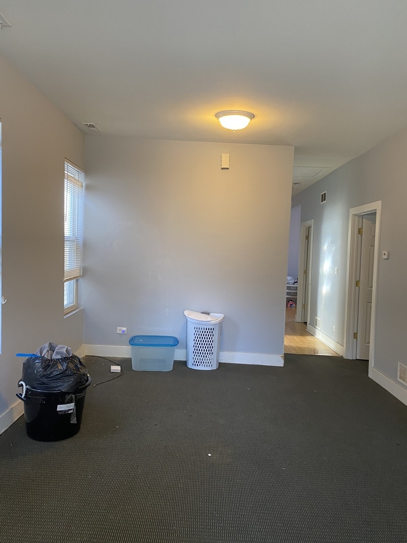 6728 South Normal Boulevard Chicago, IL 60621 - Photo 3 of 14 a room with a window