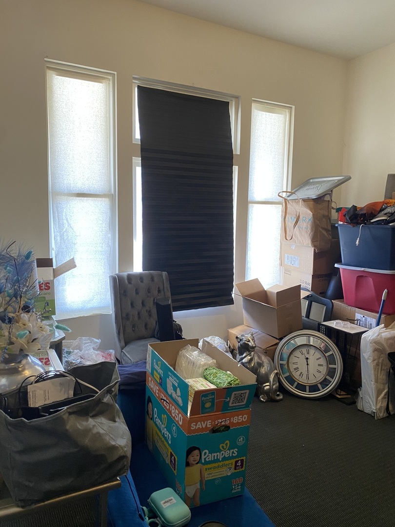 6728 South Normal Boulevard Chicago, IL 60621 - Photo 10 of 14 a living room with furniture and a fireplace