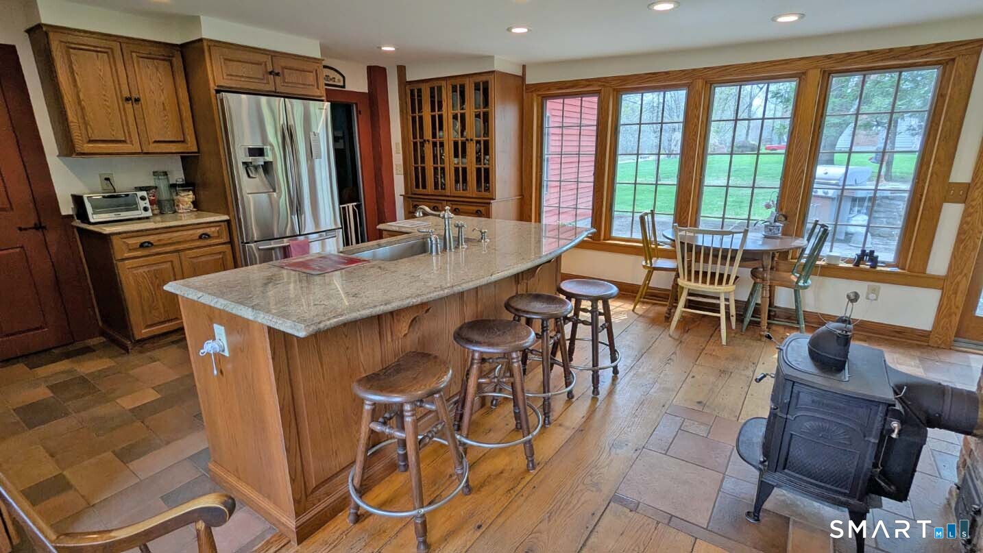 355 Wall Street Hebron, CT 06248 - Photo 13 of 39 a very nice looking kitchen with a large window
