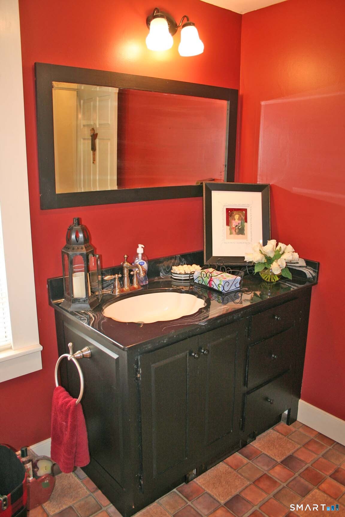 355 Wall Street Hebron, CT 06248 - Photo 19 of 39 a bathroom with a sink and a mirror