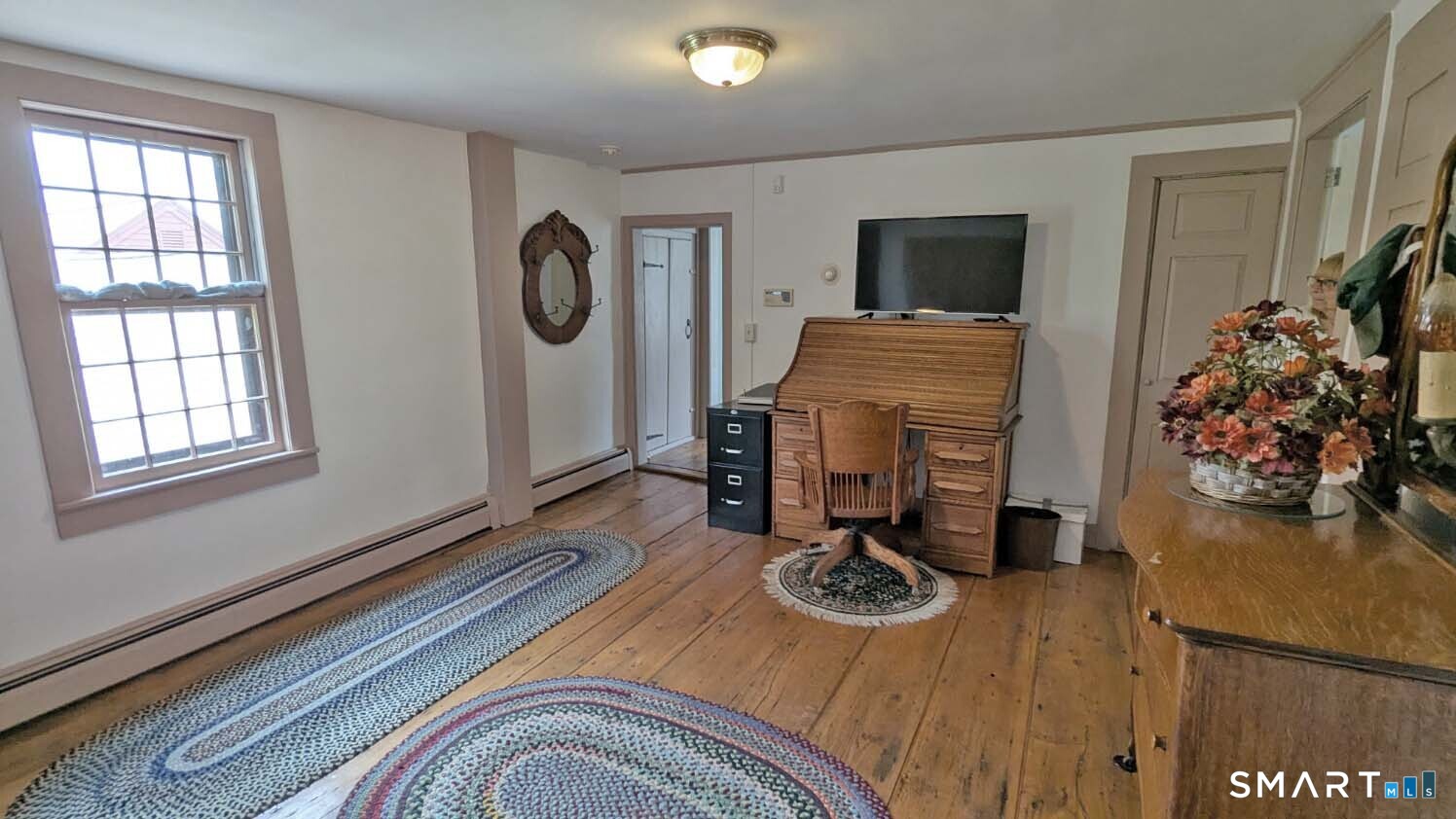 355 Wall Street Hebron, CT 06248 - Photo 26 of 39 a view of a workspace with furniture and a window