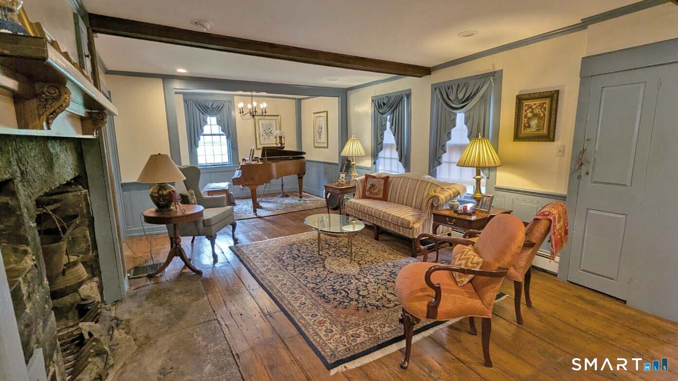 355 Wall Street Hebron, CT 06248 - Photo 5 of 39 a living room with furniture and a window