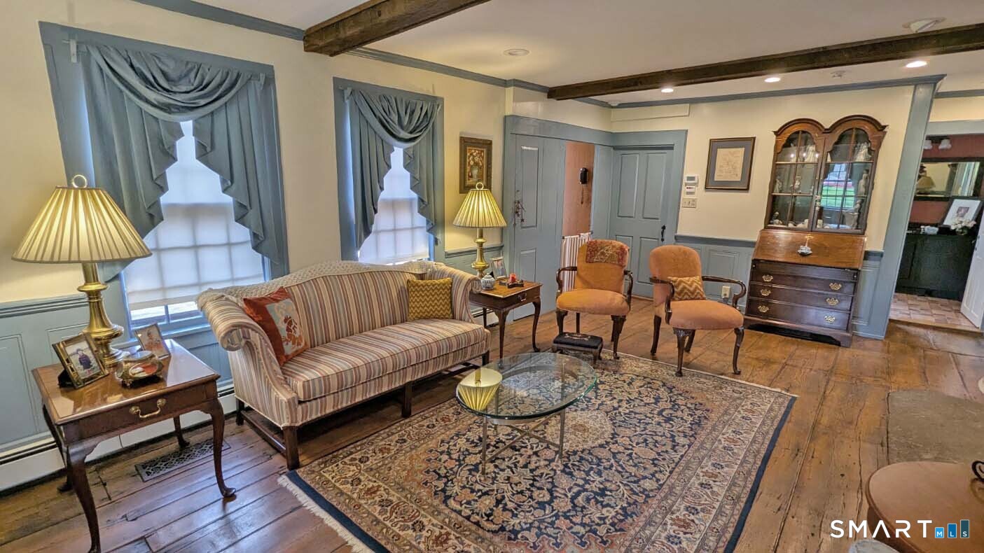 355 Wall Street Hebron, CT 06248 - Photo 6 of 39 a living room with furniture and wooden floor