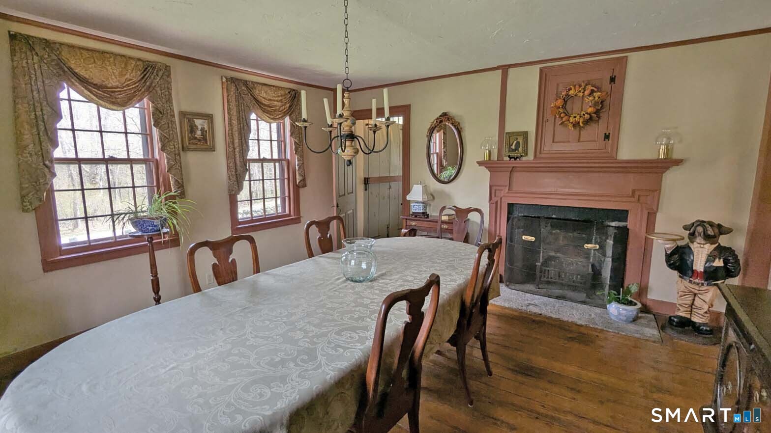355 Wall Street Hebron, CT 06248 - Photo 9 of 39 a view of a dining room with furniture window and wooden floor