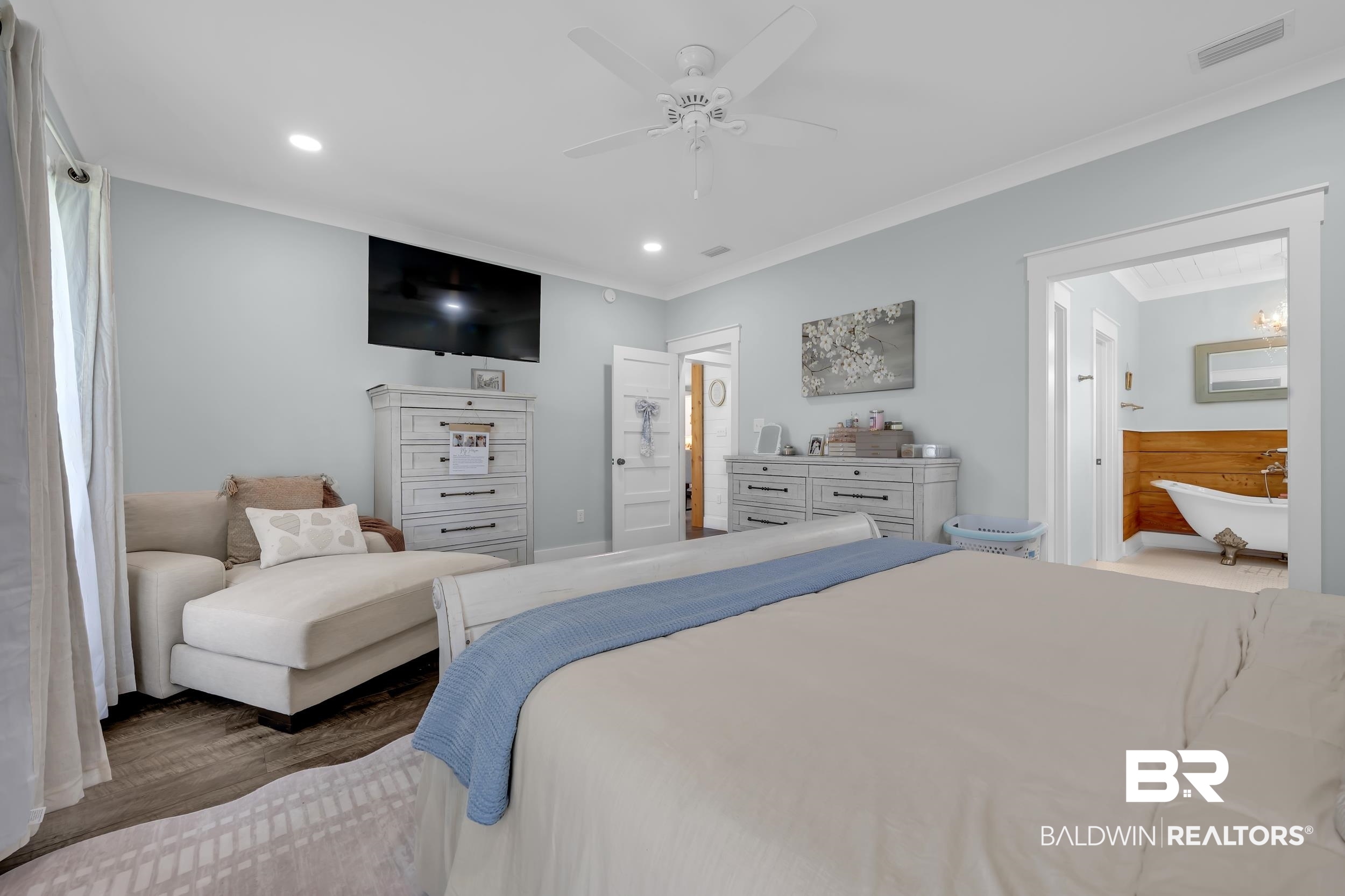 6576 Ranch Loop Road East Grand Bay, AL 36541 - Photo 19 of 39 Spacious bedroom with wood-finish flooring, recessed lighting, and a ceiling fan