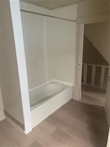 a bathroom with a bathtub