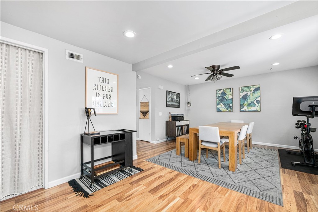 4237 Larwin Avenue Cypress, CA 90630 - Photo 18 of 48 a workspace with furniture and wooden floor