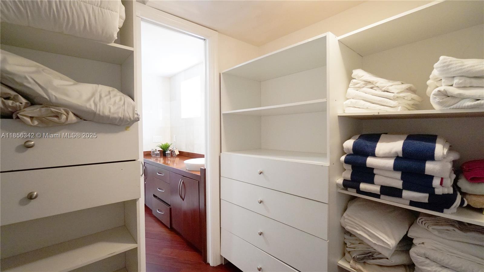 691 Ridgewood Road Key Biscayne, FL 33149 - Photo 39 of 67 a room with storage and utility