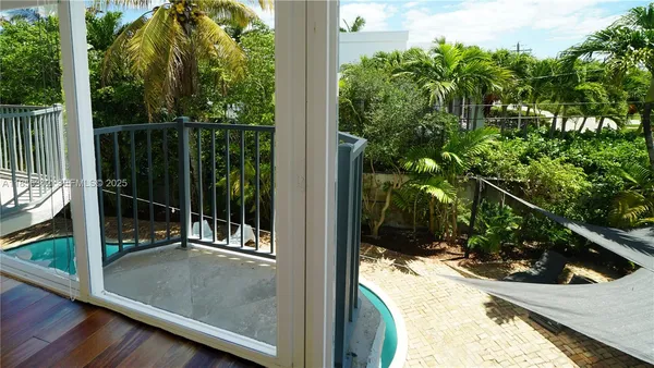 a outdoor living space with furniture and garden view