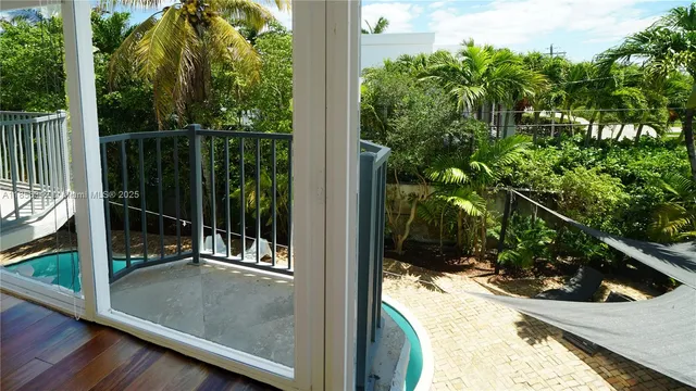 a outdoor living space with furniture and garden view