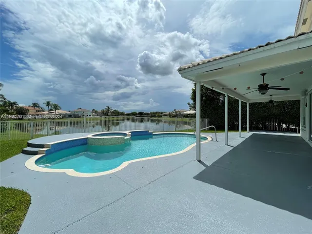 a view of a lake from a balcony
