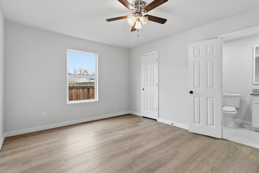 404 South Murray Street McKinney, TX 75069 - Photo 4 of 23 a view of an empty room with a window