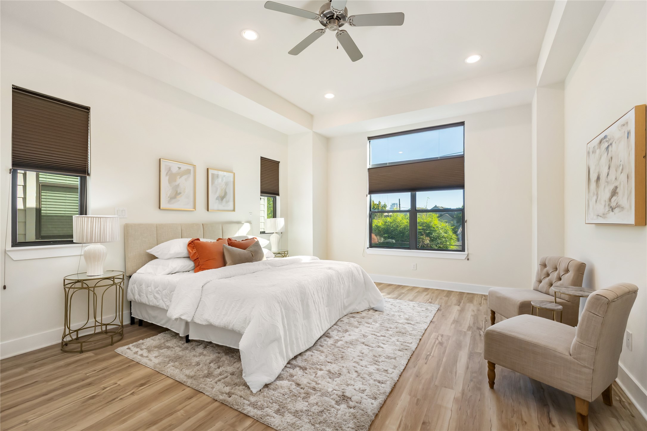 4409 Schuler Street, Unit A Houston, TX 77007 - Photo 17 of 30 a bedroom with a bed and a couch