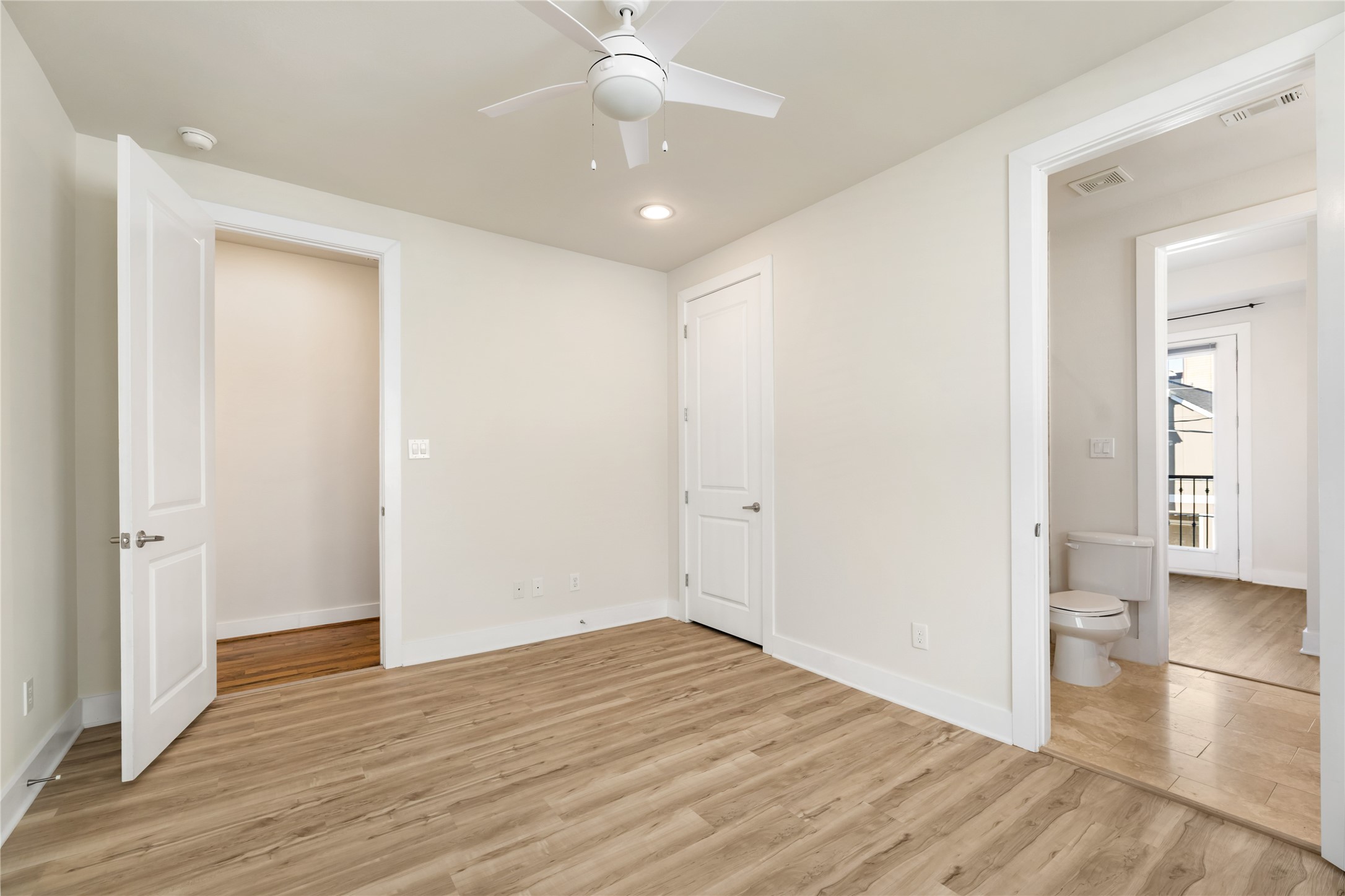4409 Schuler Street, Unit A Houston, TX 77007 - Photo 27 of 30 wooden floor in an empty room with a window