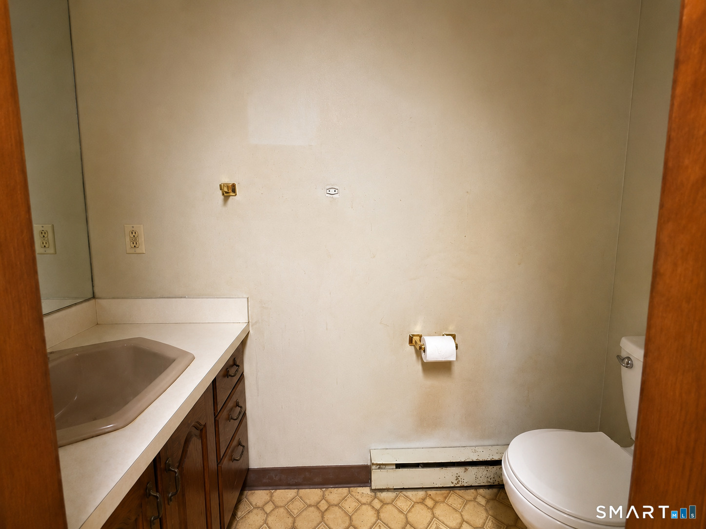 4 Ta'Agan Point Road Danbury, CT 06811 - Photo 4 of 22 a bathroom with a sink and a toilet