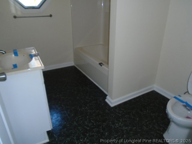 310 Hawthorne Road Fayetteville, NC 28301 - Photo 12 of 13 a bathroom with a sink and a toilet