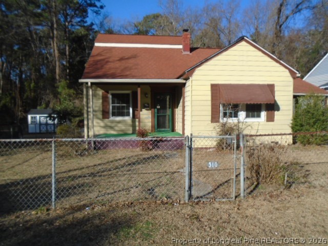 310 Hawthorne Road Fayetteville, NC 28301 - Photo 2 of 13 a view of a house with backyard