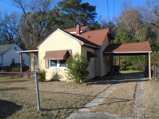 310 Hawthorne Road Fayetteville, NC 28301 - Photo 3 of 13 a front view of a house with garden