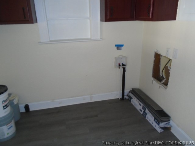 310 Hawthorne Road Fayetteville, NC 28301 - Photo 6 of 13 a view of storage and utility room with wooden floor
