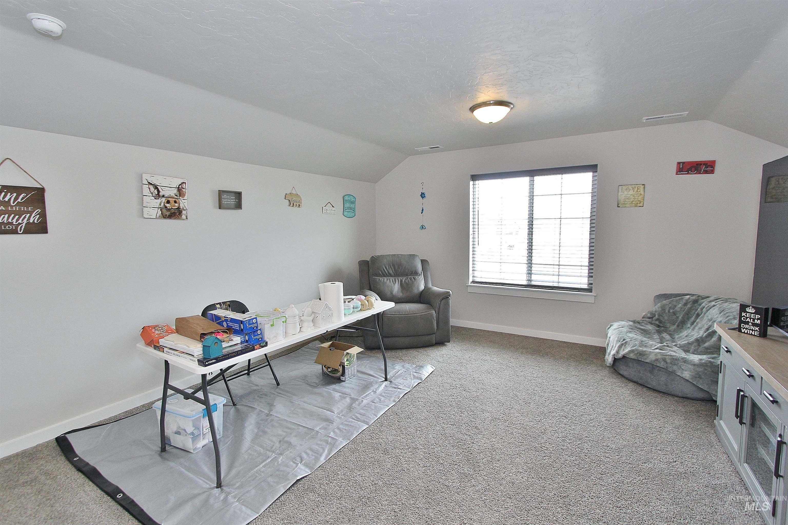 1211 Mahogany Street Parma, ID 83660 - Photo 14 of 22 Home office with light colored carpet