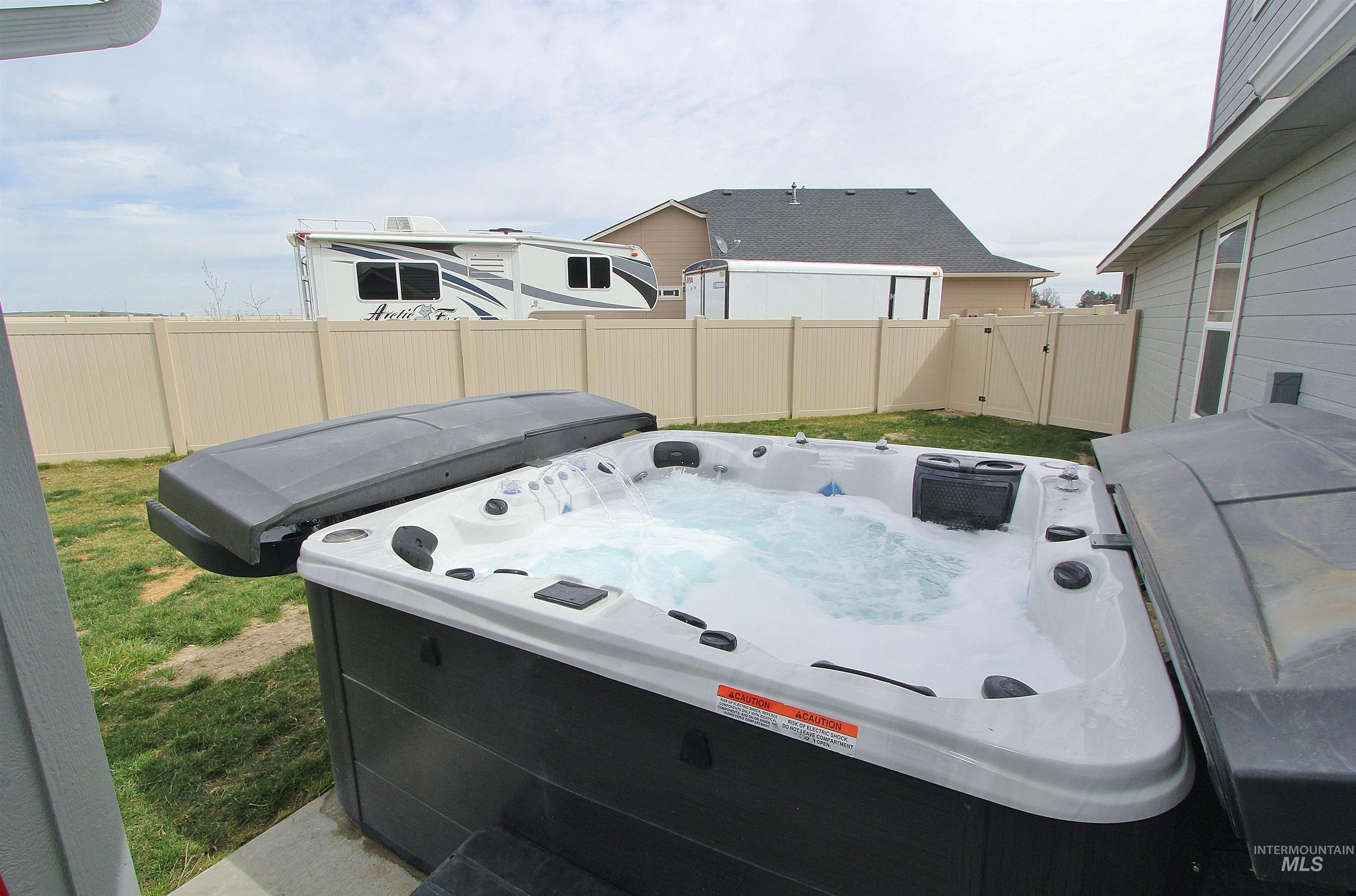 1211 Mahogany Street Parma, ID 83660 - Photo 19 of 22 Fenced backyard with a gate
