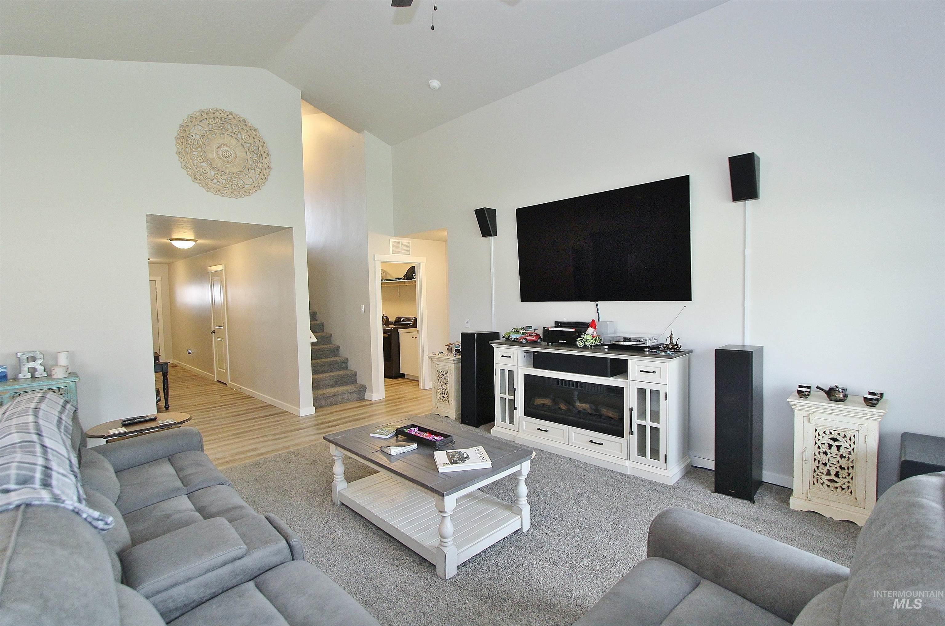 1211 Mahogany Street Parma, ID 83660 - Photo 2 of 22 Living room featuring lofted ceiling and a ceiling fan