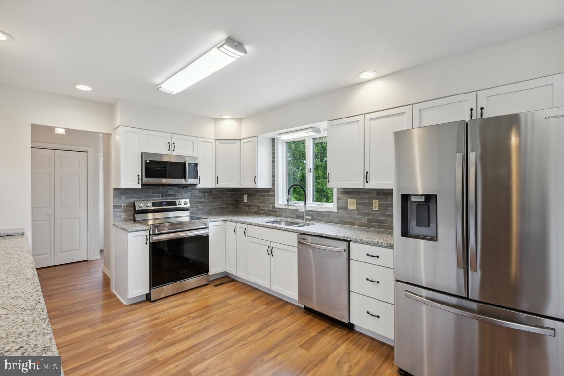 2134 Freeland Road Freeland, MD 21053 - Photo 11 of 39 Renovated kitchen w/ ss appliances & granite