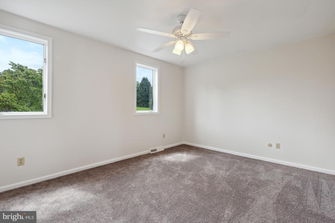 2134 Freeland Road Freeland, MD 21053 - Photo 18 of 39 Bedroom 2 - new carpet and ceiling fan/light fixtu