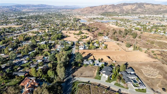 an aerial view of a house with a garden