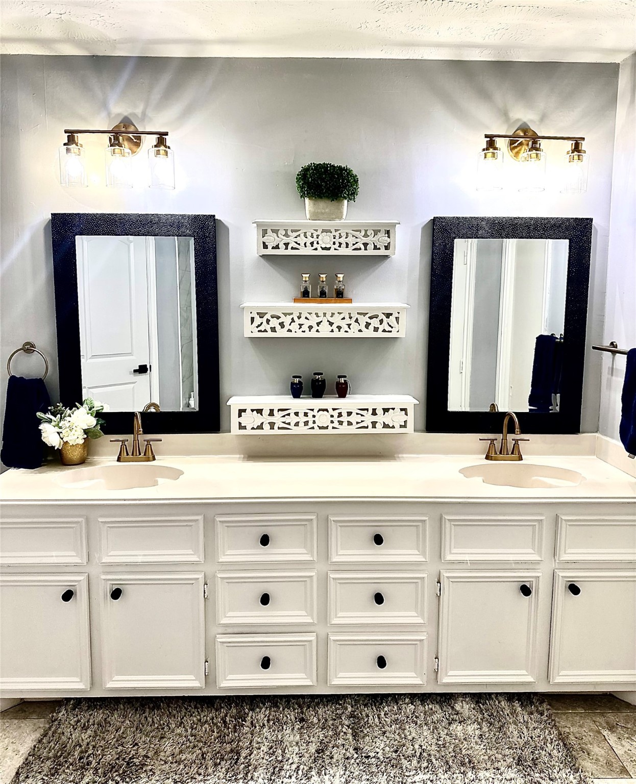 1457 Camellia Street Sweeny, TX 77480 - Photo 20 of 34 a bathroom with a sink vanity and mirror
