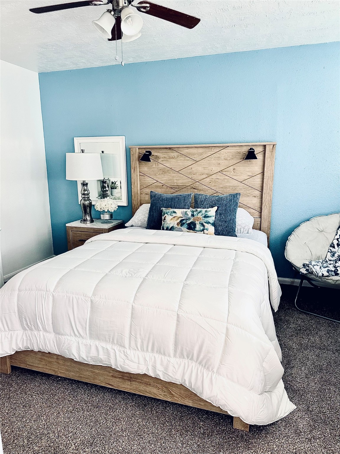 1457 Camellia Street Sweeny, TX 77480 - Photo 24 of 34 a large bed sitting in a bedroom next to a window