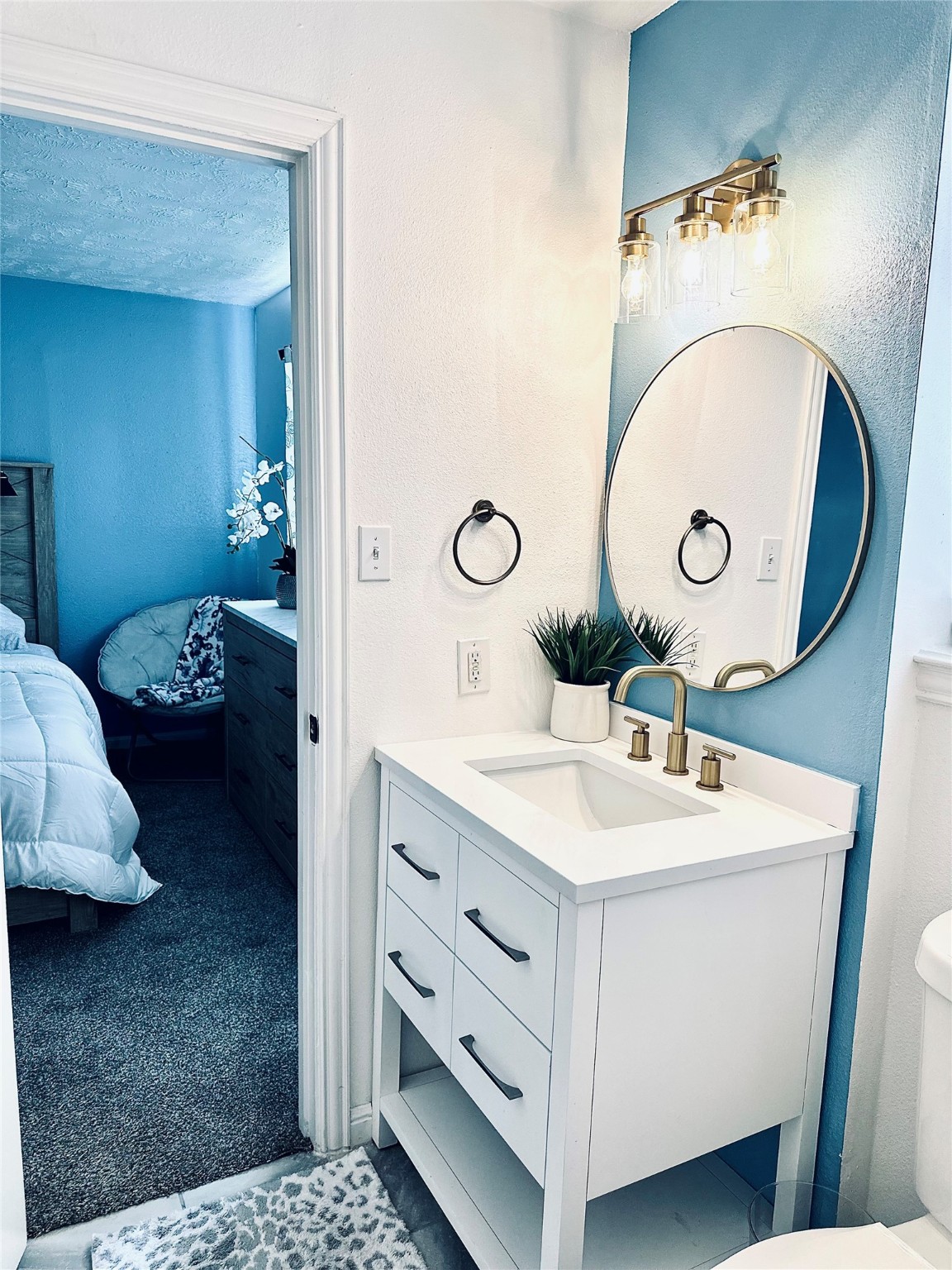 1457 Camellia Street Sweeny, TX 77480 - Photo 25 of 34 a en suite bathroom with a sink and a mirror