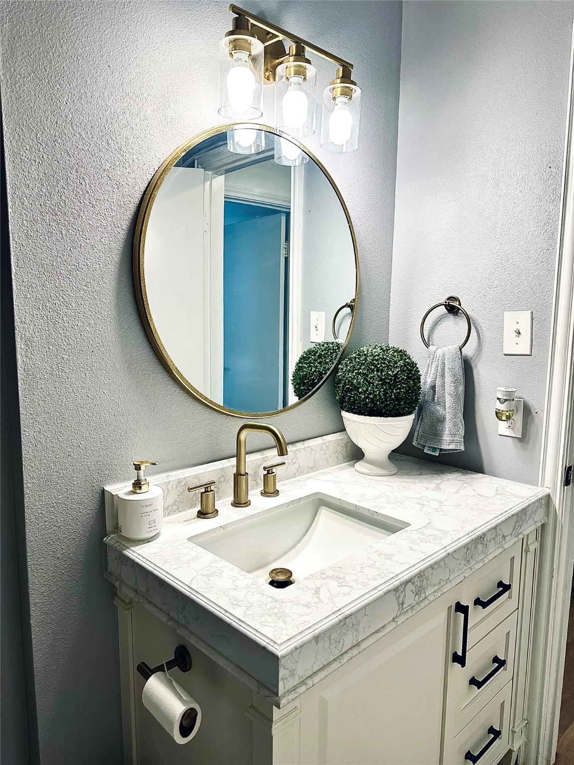 1457 Camellia Street Sweeny, TX 77480 - Photo 29 of 34 a bathroom with a granite countertop sink and a mirror