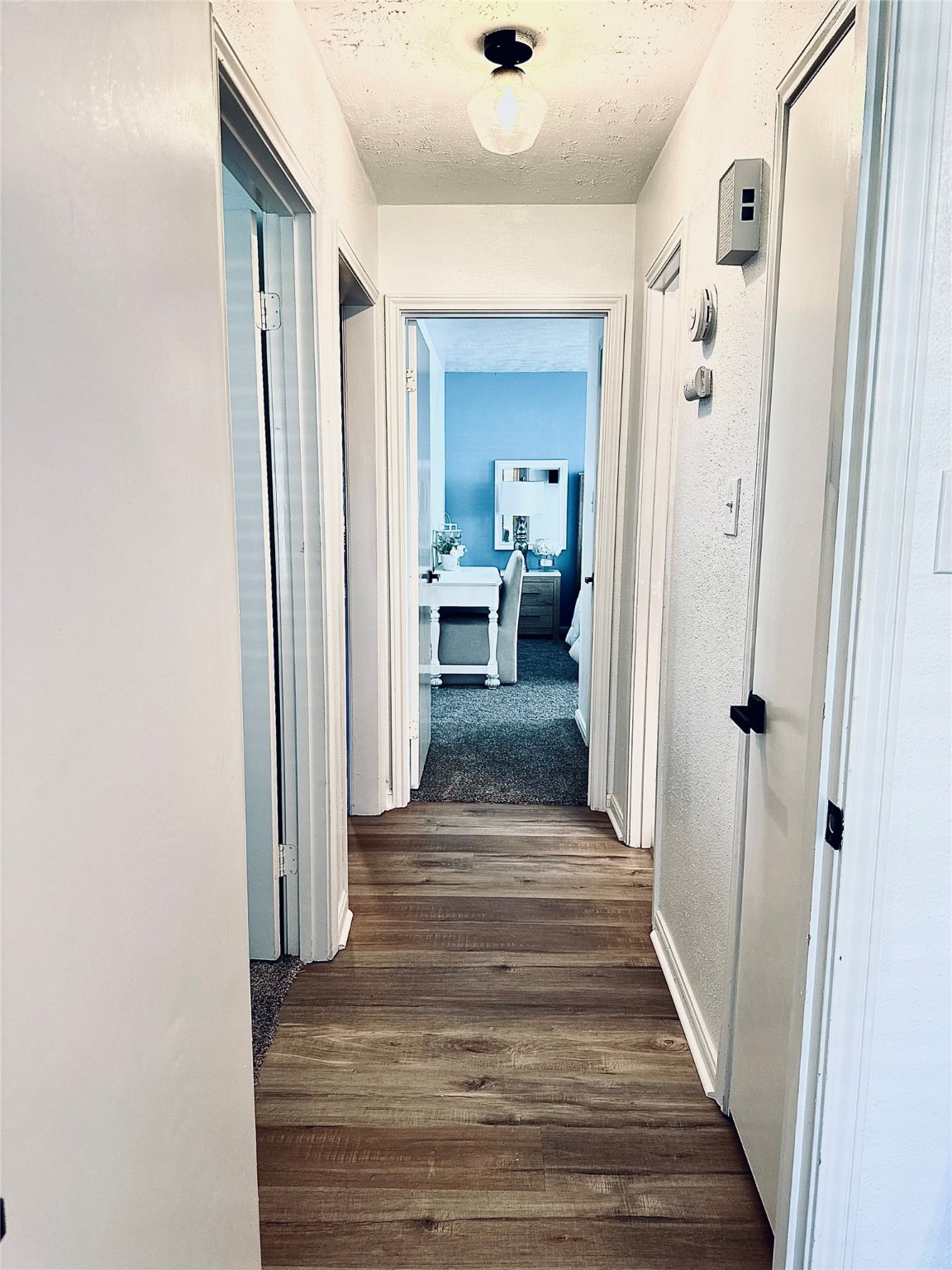 1457 Camellia Street Sweeny, TX 77480 - Photo 32 of 34 a view of a hallway view with wooden floor and staircase
